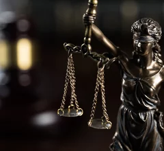 statue justice legal verdict malpractice case lawsuit scale