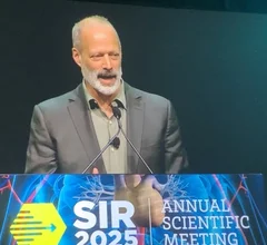 Sebastian Junger speaking at SIR 2025