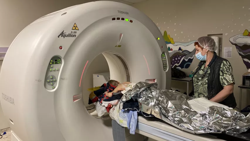 A 4-year-old boy with a severe shrapnel injury to his back gets a CT scan to assess any internal damage at the National Children's Specialized Hospital (Ohmatdyt) in Kyiv in early March 2022. The imaging was used to help guide surgery to treat the wound and removed the non-viable tissues. The hospital said the spinal cord and other internal organs were not affected. He was returning home with his father when Russian soldiers fired missiles at a district in Kyiv. #Ukraine #UkraineWar #Ukraineradiology