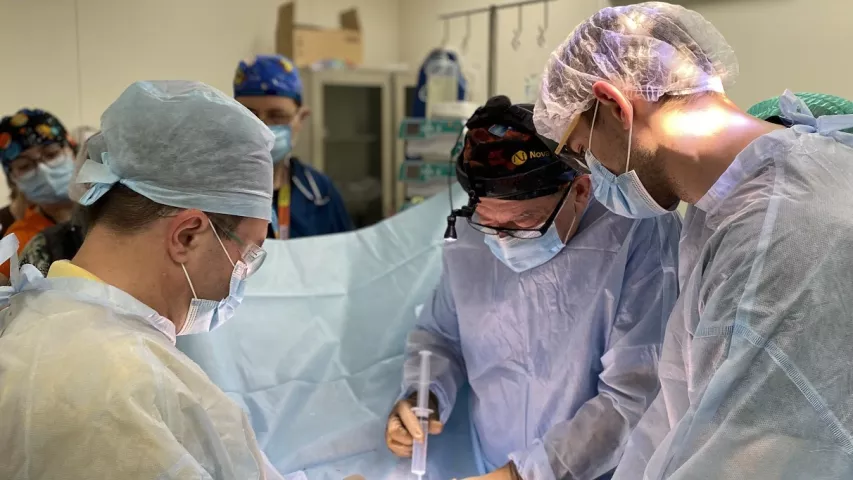 A 4-year-old boy with a severe shrapnel injury to his back undergoes surgery, using CT and ultrasound imaging to help guide the procedure to removed the non-viable tissues at the National Children's Specialized Hospital (Ohmatdyt) in Kyiv in early March 2022. #UkraineWar #RussiaUkraineWar #Ukraine