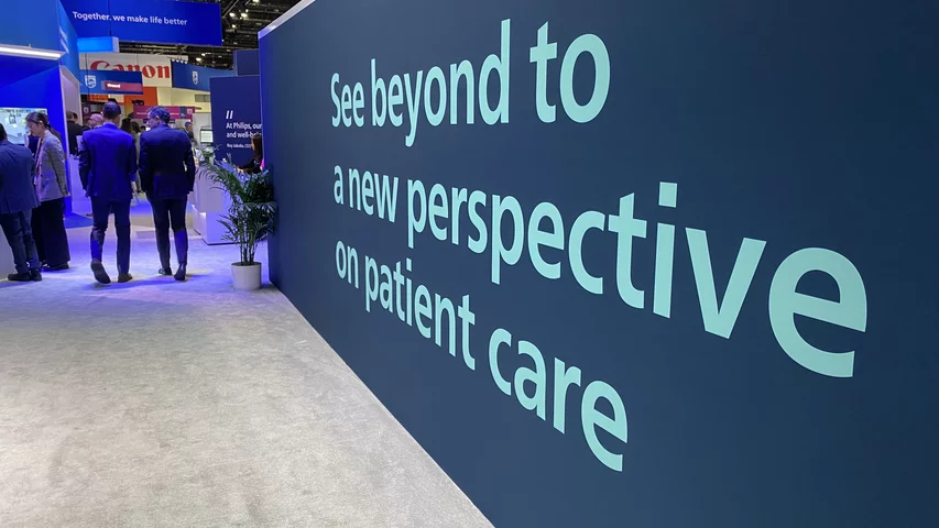 Advancing patient care sign at Philips booth RSNA23