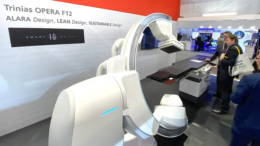 The Shimadzu Trinias Opera angiography system is the first to offer voice-activated control of the C-arm, display and other system features so the interventional operator does not have to explain instructions to a technologist, or break the sterile field. Photo by Dave Fornell