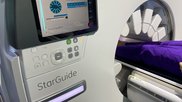 The GE Starguide SPECT-CT system uses arms containing the SPECT detectors that extent to the patient to enable clearer imaging. Photo by Dave Fornell. #RSNA #RSNA23 #RSNA2023