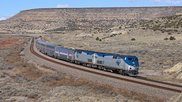 Amtrak eastbound Southwest Chief about to pass under Route 66