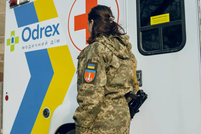 An armed member of a Ukrainian territorial defense unit checks out a new ambulance being donated Odrex Hospital in Odesa, Ukraine. The hospital donated the ambulance to enable the local unit the ability to transfer wounded to the hospital with current state-of-the art technology. Image courtesy of Odrex. #Supportukraine #StandwithUkraine #russiaukrainewar