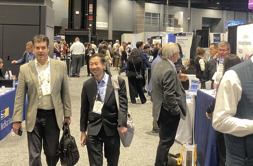 A busy section of recruiters row at RSNA 2024. There were about 60 hospital system and practice recruiters at RSNA this year, which is a major increase from pre-pandemic numbers. Photo by Dave Fornell