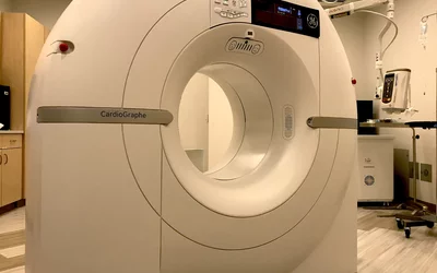 The Cardiographe cardiac CT system was co-developed by GE Healthcare and Arineta. Its design included all the aspects of a CT scanner that are ideal for cardiac CT, and left out features included on workhorse CT systems for imaging other parts of the body. Both companies now sell the system. Arineta set up its own booth at RSNA 2021 because of a large amount of interest in its system after the ACC 2021 chest pain guidelines were released.