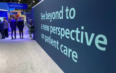 Advancing patient care sign at Philips booth RSNA23