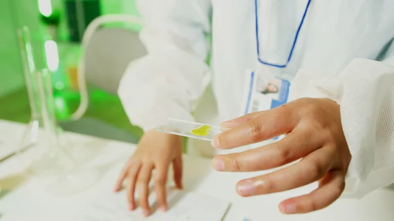 pathologist_with_slide.jpg